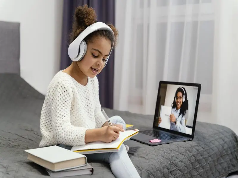 School learner receiving personalised online tutoring